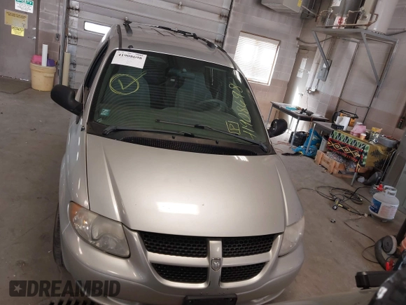 2003 Dodge Grand Caravan with VIN 2D4GP44353R166193, listed as a IAAI auction lot 41908698 with 181,371 mi miles and . Bid and sale history available at DreamBid. Image 12.