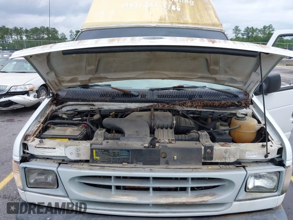 2002 Ford Econoline Cargo с VIN 1FTSE34L92HA84131, выставлен на аукционе IAAI как лот 42404153 с пробегом 175 259 миль миль и . История ставок и продаж доступна на DreamBid. Изображение 10.