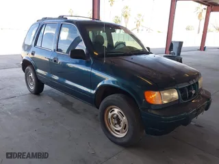 2000 Kia Sportage with VIN KNDJB7232Y5651398, listed as a IAAI auction lot 41678617 with 156,144 mi miles. Bid and sale history available at carsss.com. Image 1.
