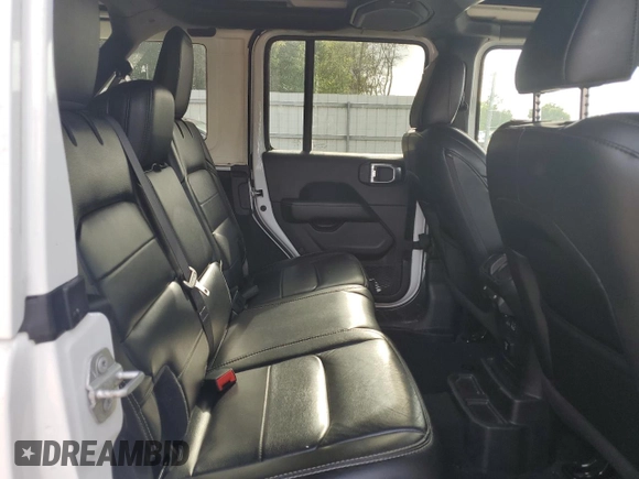 2020 Jeep Wrangler Unlimited Sahara with VIN 1C4HJXEN5LW207076, listed as a Copart auction lot 59461645 with 57,559 mi miles and Salvage title. Bid and sale history available at DreamBid. Image 10.