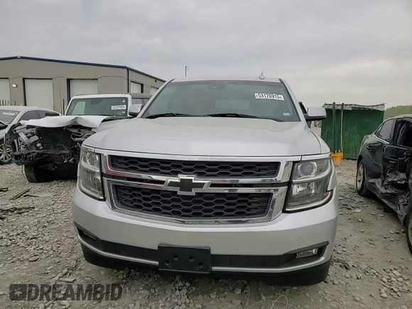 2016 Chevrolet Tahoe LT z VIN 1GNSKBKC4GR438992, wystawiony jako Copart lot #53170915 z przebiegiem 129 009 mil mil oraz Szkoda całkowita • Salvage title. Historia ofert i sprzedaży dostępna na DreamBid. Obrazek 14.