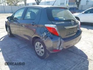 2014 Toyota Yaris L with VIN JTDKTUD35ED596329, listed as a IAAI auction lot 41705004 with 191,557 mi miles. Bid and sale history available at carsss.com. Image 3.