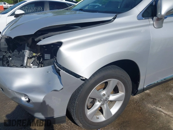 2012 Lexus RX 350 z VIN 2T2BK1BA5CC129663, wystawiony jako IAAI lot #42198701 z przebiegiem 156 525 mil mil oraz . Historia ofert i sprzedaży dostępna na DreamBid. Obrazek 18.