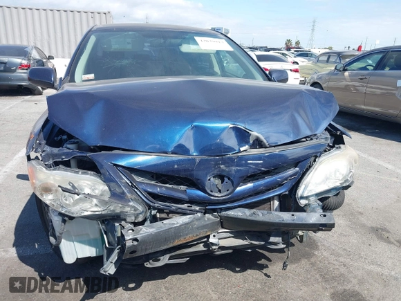 2013 Toyota Corolla L with VIN 5YFBU4EE0DP106114, listed as a IAAI auction lot 42039913 with 184,518 mi miles and . Bid and sale history available at DreamBid. Image 12.