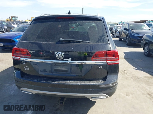 2018 Volkswagen Atlas SE with VIN 1V2DR2CA1JC546005, listed as a IAAI auction lot 41724133 with 116,633 mi miles and . Bid and sale history available at DreamBid. Image 16.