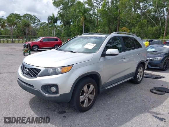 2012 Kia Sorento EX with VIN 5XYKUDA20CG206132, listed as a IAAI auction lot 42018015 with 138,158 mi miles. Bid and sale history available at carsss.com. Image 2.
