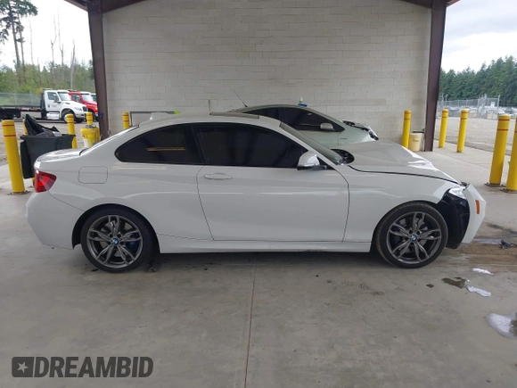 2016 BMW 2 Series M235i z VIN WBA1J7C52GV360561, wystawiony jako IAAI lot #42429129 z przebiegiem 90 218 mil mil oraz . Historia ofert i sprzedaży dostępna na DreamBid. Obrazek 13.