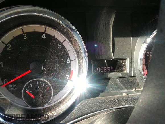 2014 Dodge Grand Caravan American Value with VIN 2C4RDGBG7ER345277, listed as a IAAI auction lot 42061355 with 145,889 mi miles and . Bid and sale history available at DreamBid. Image 15.