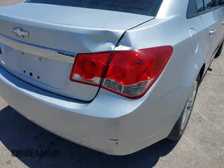 2014 Chevrolet Cruze LS z VIN 1G1PA5SH6E7448472, wystawiony jako IAAI lot #42428958 z przebiegiem 105 872 mil mil oraz . Historia ofert i sprzedaży dostępna na DreamBid. Obrazek 6.