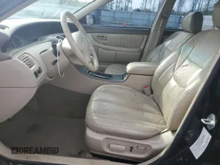 2002 Toyota Avalon XL with VIN 4T1BF28B32U203061, listed as a Copart auction lot 51416235 with 255,350 mi miles and Salvage Title. Bid and sale history available at DreamBid. Image 7.