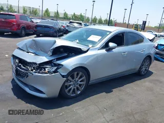 2020 Mazda 3 Select with VIN 3MZBPACL1LM131999, listed as a IAAI auction lot 42433532 with 23,067 mi miles and . Bid and sale history available at DreamBid. Image 15.