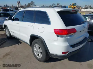 2014 Jeep Grand Cherokee Laredo with VIN 1C4RJEAGXEC130399, listed as a IAAI auction lot 41861664 with 106,925 mi miles. Bid and sale history available at carsss.com. Image 3.