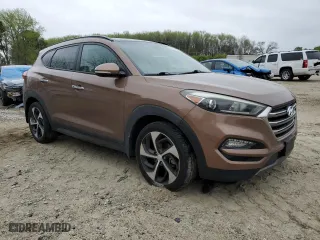 2016 Hyundai Tucson Sport with VIN KM8J33A27GU180749, listed as a Copart auction lot 51659865 with 70,506 mi miles and Salvage Title. Bid and sale history available at carsss.com. Image 4.