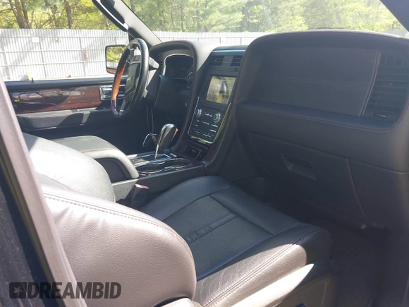 2017 Lincoln Navigator Reserve with VIN 5LMJJ2LT5HEL08002, listed as a IAAI auction lot 42199287 with 102,883 mi miles and . Bid and sale history available at DreamBid. Image 5.