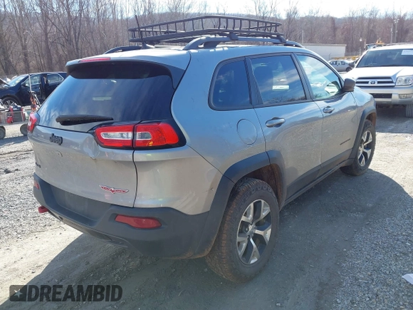 2016 Jeep Cherokee Trailhawk z VIN 1C4PJMBB6GW335837, wystawiony jako IAAI lot #41547478 z przebiegiem 236 483 mil mil oraz . Historia ofert i sprzedaży dostępna na DreamBid. Obrazek 4.