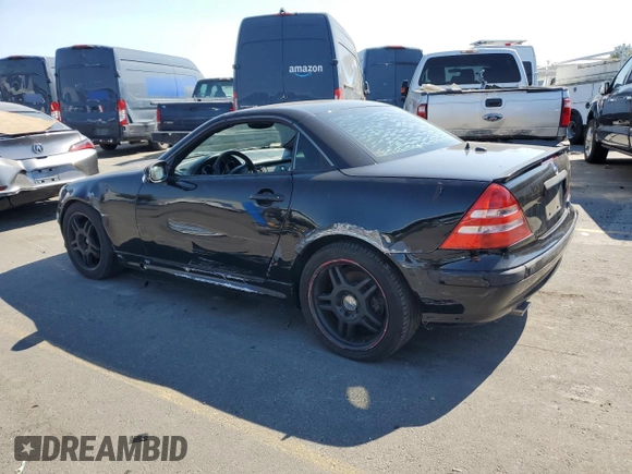 2001 Mercedes-Benz SLK-Class with VIN WDBKK65F71F175734, listed as a Copart auction lot 61874984 with 185,408 mi miles and Salvage Title. Bid and sale history available at carsss.com. Image 2.