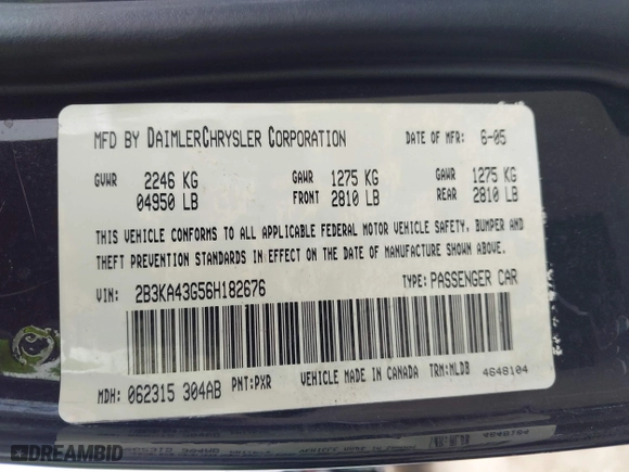 2006 Dodge Charger with VIN 2B3KA43G56H182676, listed as a IAAI auction lot 42052425 with 301,664 mi miles. Bid and sale history available at carsss.com. Image 9.