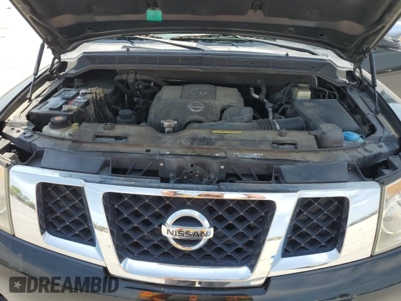 2014 Nissan Armada Platinum z VIN 5N1BA0NF8EN610981, wystawiony jako Copart lot #53144515 z przebiegiem 188 423 mil mil oraz Szkoda całkowita • Salvage title. Historia ofert i sprzedaży dostępna na DreamBid. Obrazek 12.