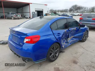 2016 Subaru WRX Limited with VIN JF1VA1L69G8816859, listed as a IAAI auction lot 41476348 with 141,934 mi miles. Bid and sale history available at carsss.com. Image 4.