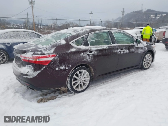 2014 Toyota Avalon Limited with VIN 4T1BK1EB1EU106004, listed as a IAAI auction lot 41341771 with 86,608 mi miles and . Bid and sale history available at DreamBid. Image 4.