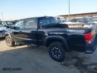 2016 Toyota Tacoma SR5 with VIN 3TMDZ5BN8GM004995, listed as a IAAI auction lot 41979497 with 91,227 mi miles. Bid and sale history available at carsss.com. Image 14.