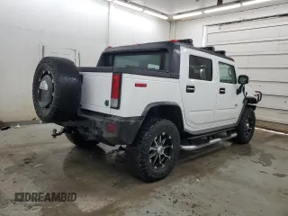 2005 Hummer H2 SUT with VIN 5GRGN22U15H123731, listed as a Copart auction lot 87680395 with 205,043 mi miles and Salvage Title. Bid and sale history available at carsss.com. Image 3.