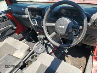 2008 Jeep Wrangler X with VIN 1J4FZ24188L607332, listed as a Copart auction lot 54507785 with 184,153 mi miles and Salvage title. Bid and sale history available at DreamBid. Image 8.