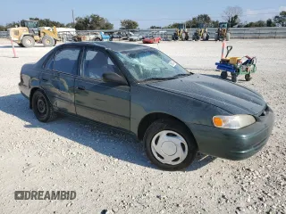 2000 Toyota Corolla VE with VIN 1NXBR12E5YZ387383, listed as a Copart auction lot 78931374 with 162,008 mi miles and Salvage title. Bid and sale history available at DreamBid. Image 4.
