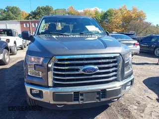 2015 Ford F-150 XLT with VIN 1FTEW1EF7FFB65198, listed as a IAAI auction lot 40509417 with 119,649 mi miles and . Bid and sale history available at DreamBid. Image 13.