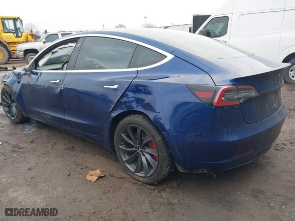 2018 Tesla Model 3 Long Range Battery with VIN 5YJ3E1EB2JF180275, listed as a IAAI auction lot 41196064 with 110,535 mi miles. Bid and sale history available at carsss.com. Image 3.