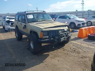 1995 Jeep Cherokee Sport with VIN 1J4FJ68S3SL555908, listed as a IAAI auction lot 42222016 with 283,444 mi miles and . Bid and sale history available at DreamBid. Image 1.