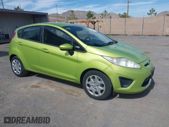 2011 Ford Fiesta SE with VIN 3FADP4EJ8BM157173, listed as a IAAI auction lot 41972892 with 407,227 mi miles. Bid and sale history available at carsss.com. Image 1.