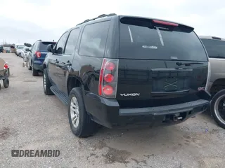 2009 GMC Yukon SLT w/4SA with VIN 1GKFC33J39R295065, listed as a IAAI auction lot 41514132 with 216,680 mi miles. Bid and sale history available at carsss.com. Image 3.