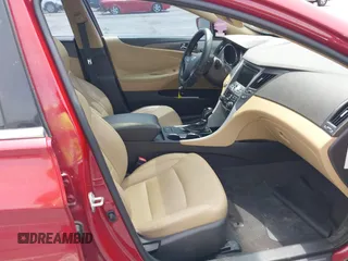 2013 Hyundai Sonata with VIN KMHEC4A49DA068685, listed as a IAAI auction lot 42211683 with 123,769 mi miles and . Bid and sale history available at carsss.com. Image 5.