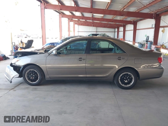 2006 Toyota Camry STD with VIN 4T1BE32K36U723879, listed as a IAAI auction lot 42007707 with 186,885 mi miles. Bid and sale history available at carsss.com. Image 14.