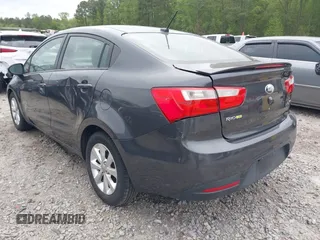 2013 Kia Rio EX with VIN KNADN4A34D6285952, listed as a IAAI auction lot 42036441 with 153,462 mi miles and . Bid and sale history available at DreamBid. Image 3.