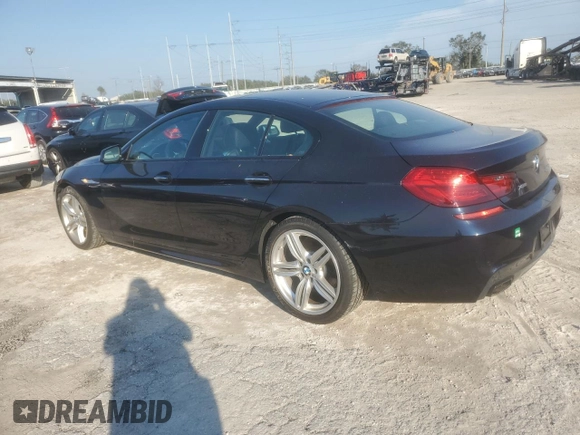 2015 BMW 6 Series 650i xDrive with VIN WBA6B4C55FD761530, listed as a Copart auction lot 75430464 with 18,729 mi miles and Salvage Title. Bid and sale history available at DreamBid. Image 2.