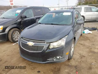 2014 Chevrolet Cruze 1LT with VIN 1G1PC5SB5E7229007, listed as a IAAI auction lot 41544780 with 98,075 mi miles and . Bid and sale history available at DreamBid. Image 2.