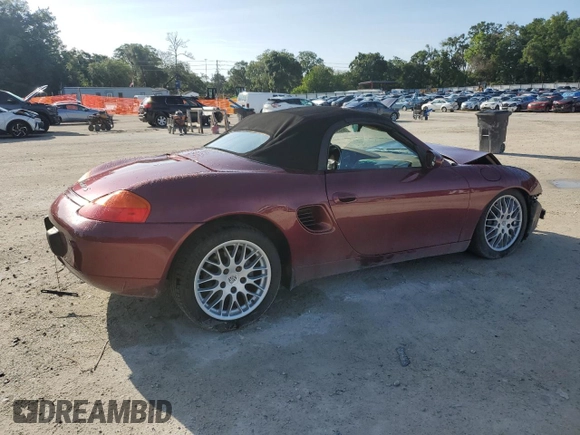 2000 Porsche Boxster z VIN WP0CA2983YU621350, wystawiony jako Copart lot #60596005 z przebiegiem 93 133 mil mil oraz Szkoda całkowita • Salvage title. Historia ofert i sprzedaży dostępna na DreamBid. Obrazek 3.