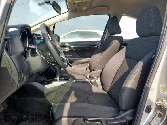 2016 Honda Fit LX with VIN JHMGK5H53GX033662, listed as a Copart auction lot 55523545 with 67,580 mi miles and Salvage title. Bid and sale history available at DreamBid. Image 7.