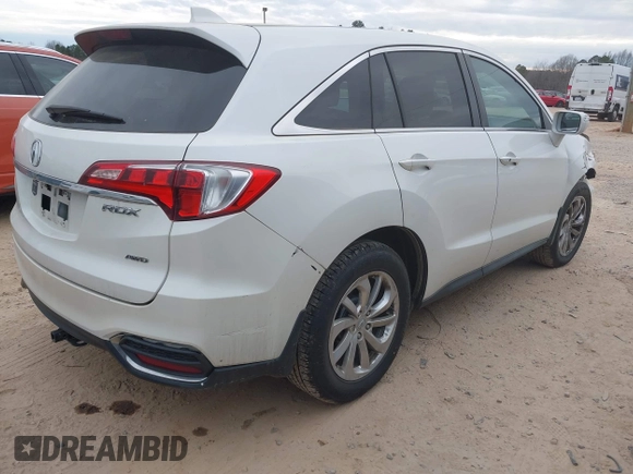 2016 Acura RDX with VIN 5J8TB4H3XGL029013, listed as a IAAI auction lot 41452976 with 131,932 mi miles. Bid and sale history available at carsss.com. Image 4.