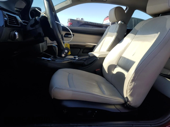 2012 BMW 3 Series 328i with VIN WBAKE5C51CE756536, listed as a Copart auction lot 86876884 with 69,010 mi miles and Salvage Title. Bid and sale history available at carsss.com. Image 7.