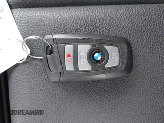 2018 BMW 3 Series 320i xDrive z VIN WBA8E5G5XJNU47665, wystawiony jako IAAI lot #42332838 z przebiegiem 97 821 mil mil oraz . Historia ofert i sprzedaży dostępna na DreamBid. Obrazek 11.