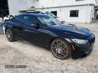 2018 BMW M4 with VIN WBS4Y9C57JAC86460, listed as a Copart auction lot 73022204 with 28,477 mi miles and Salvage Title. Bid and sale history available at carsss.com. Image 4.