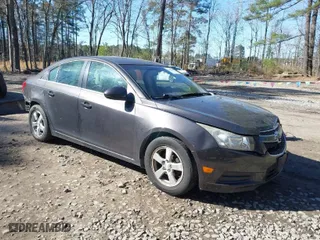 2014 Chevrolet Cruze 1LT with VIN 1G1PC5SB3E7238613, listed as a IAAI auction lot 41842648 with 147,238 mi miles. Bid and sale history available at carsss.com. Image 1.