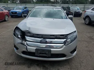 2010 Ford Fusion Hybrid with VIN 3FADP0L33AR140229, listed as a Copart auction lot 63084475 with 164,313 mi miles and Salvage title. Bid and sale history available at DreamBid. Image 5.