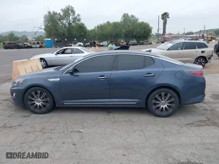 2014 Kia Optima Hybrid LX with VIN KNAGM4AD4E5066067, listed as a IAAI auction lot 41884259 with 131,077 mi miles. Bid and sale history available at carsss.com. Image 14.