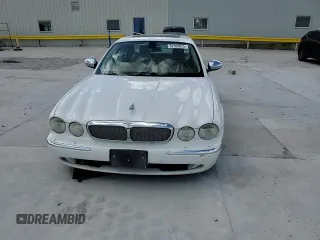 2006 Jaguar XJ Vanden Plas with VIN SAJWA82B16SH06996, listed as a Copart auction lot 62509025 with 80,236 mi miles and Salvage title. Bid and sale history available at DreamBid. Image 13.