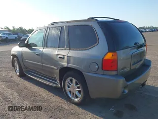 2008 GMC Envoy Denali with VIN 1GKES63M982258281, listed as a IAAI auction lot 42022548 with 265,129 mi miles. Bid and sale history available at carsss.com. Image 3.