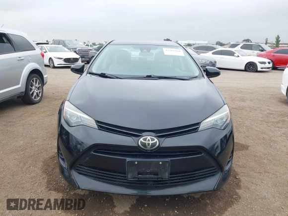 2018 Toyota Corolla L with VIN 5YFBURHE3JP794243, listed as a IAAI auction lot 42281880 with 41,659 mi miles and . Bid and sale history available at DreamBid. Image 12.